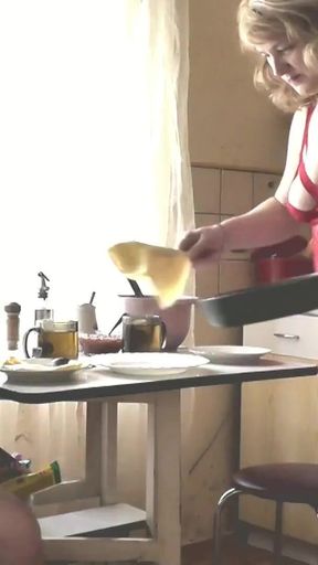 Thrilling moment from &quot;Adult woman blonde in transparent negligee and beautiful cute brunette naked girl cooks in kitchen.&quot;