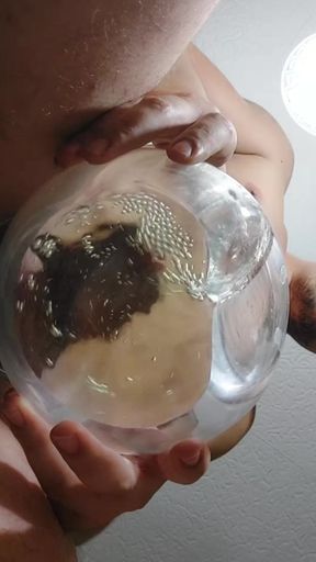 Watch me play with with my hard penis and pee into a goldfish bowl!