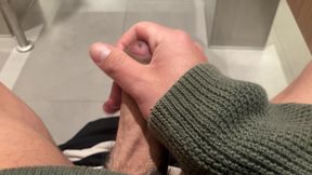 jerking off at the airport's restroom