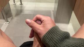 jerking off at the airport's restroom