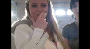 Slutty teens smoking a cigarettes in close up video
