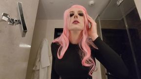 Sandy gets herself ready to go to the office. She loves pink !