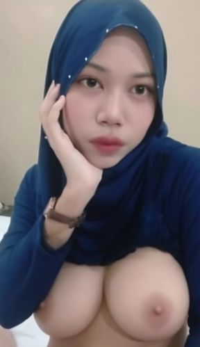 Malaysian teen shows off her perky tits