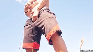 Mischievous fellow wanking his XXL meatpipe in a public beach - risky onanism