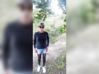Hot crossdresser in nature posing