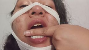 Hungry mummy bites her fingers
