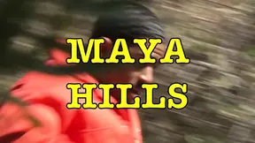Maya Hills kneels in the kitchen and gives a deepthroat blowjob to her