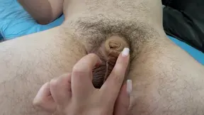 Tiny cock receives a cumshot in this short scene, despite its length of