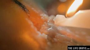 ”THE LIFE EROTIC Hot brunette squirting as she fucks herself with a lit candle”