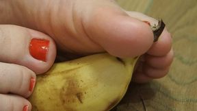 Playing with my toes and banana