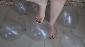 Big feet popping balloons