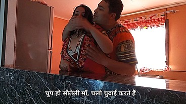 Indian stepmother gets fucked by her stepson in the kitchen.