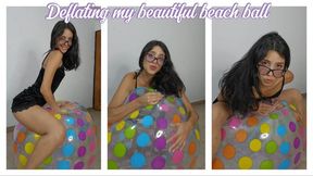 Deflating my beautiful beach ball