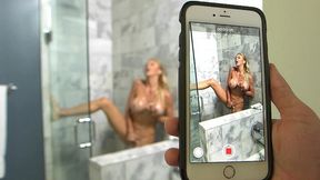 Busty blonde Alexis Fawx plays with her pussy during shower