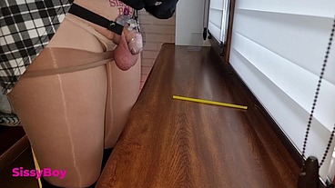 NYLON CUM. SISSY IN DRESS AND PANTYHOSE CUMS IN CHASTITY.