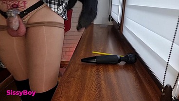 NYLON CUM. SISSY IN DRESS AND PANTYHOSE CUMS IN CHASTITY.