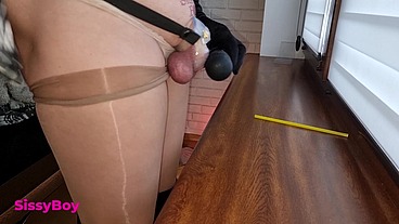 NYLON CUM. SISSY IN DRESS AND PANTYHOSE CUMS IN CHASTITY.