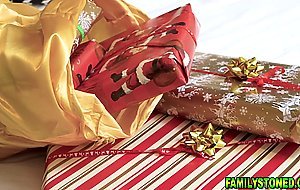 Stepmom joins stepdaughter sucking Santas cock together