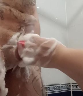 Fingering my cock with a soapy sponge #1