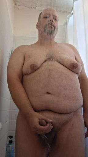 Chubby guy jerks in the shower