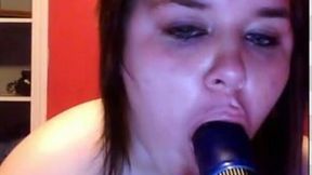 Chubby brunette girl sucking big dildo in amateur webcam video