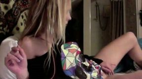Blonde cutie masturbates her pussy in homemade solo scene