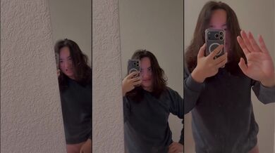 Hot Asian chick masturbating in the mirror