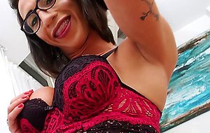 Busty latina TS in glasses stroking her giant cock