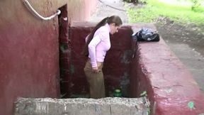 Busty long-haired bitch pees her pants while walking down the street