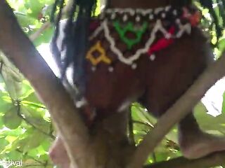 Slender Nigerian tribe gal masturbating on a tree