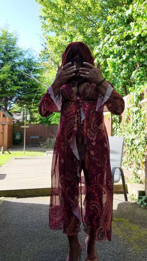Crossdressing kellycd2022 enjoying the lovely warm weather in nylon and heels