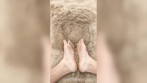 Bare feet playing in the sand Sensory purposes