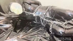 Metal bondage and latex hood play