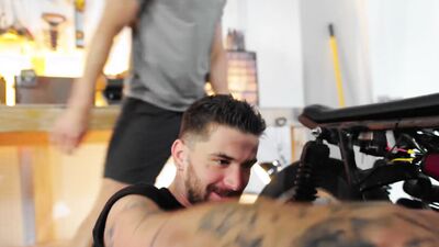 Jock bent over a bike and railed by a stud