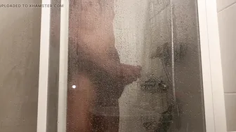 Muscular British hunk strokes big cock in shower solo
