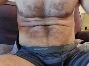 MUSCLE BEAR IN STRIPED BOXER BREIFS FLEXING ARMS AND CHEST!