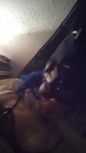 Submissive masked slave