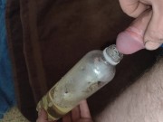 Filling a bottle with piss~