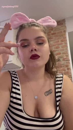 Smoking with red lipstick on