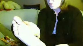 Mature UK webcam wife shows off her delicious tender soles