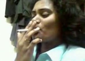 Fucking ugly Indian bitch flashes her tits while smoking cigarette