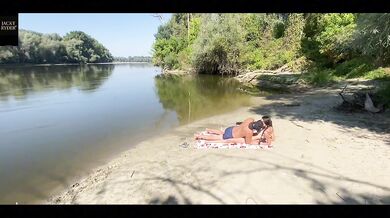 Sunbathing babe got seduced right on the beach in amateur POV