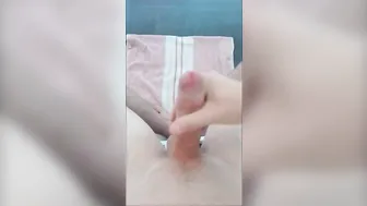 Twink strokes his uncut cock and shoots a load on a towel