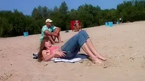 Real beach nudist pussies stretching on the sand