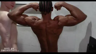 Muscled jock takes two bareback loads from a tattooed hunk