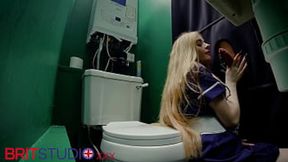 Nurse with long hair deepthroats and swallows cum at the gloryhole