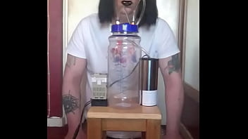 bisexual crossdresser with his portable cow milking machine part 2