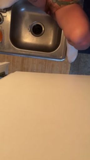 Piss Slut pissing trying to get her bubbles down the sink