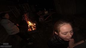Homeless girls blow and swallow cum near a warm fire