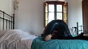 wearing a latex condom catsuit and high heels ankle boots i have to suck a big cock and swallow cum